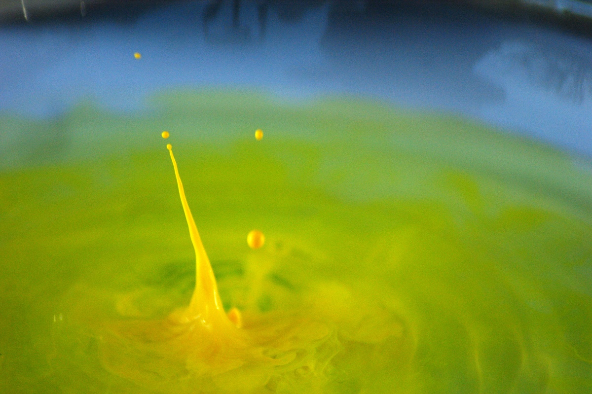 Another World 10 - Yellow ink into green and blue water.