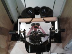bino mounted on yoke of telescope stand.
can swing left and right, my reflection in mirror taking shot.
