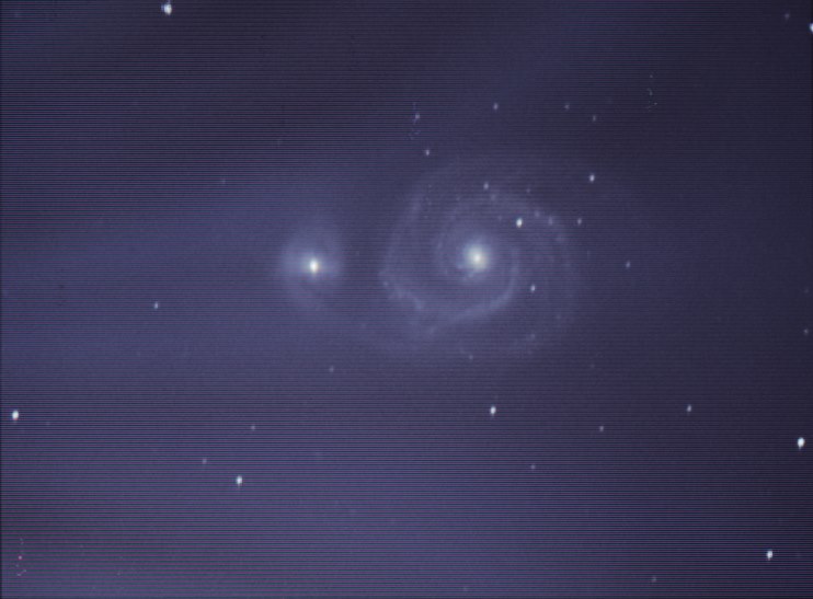 M51 Whirlpool Galaxy light clouds