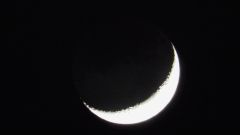 waxing crescent with earthshine