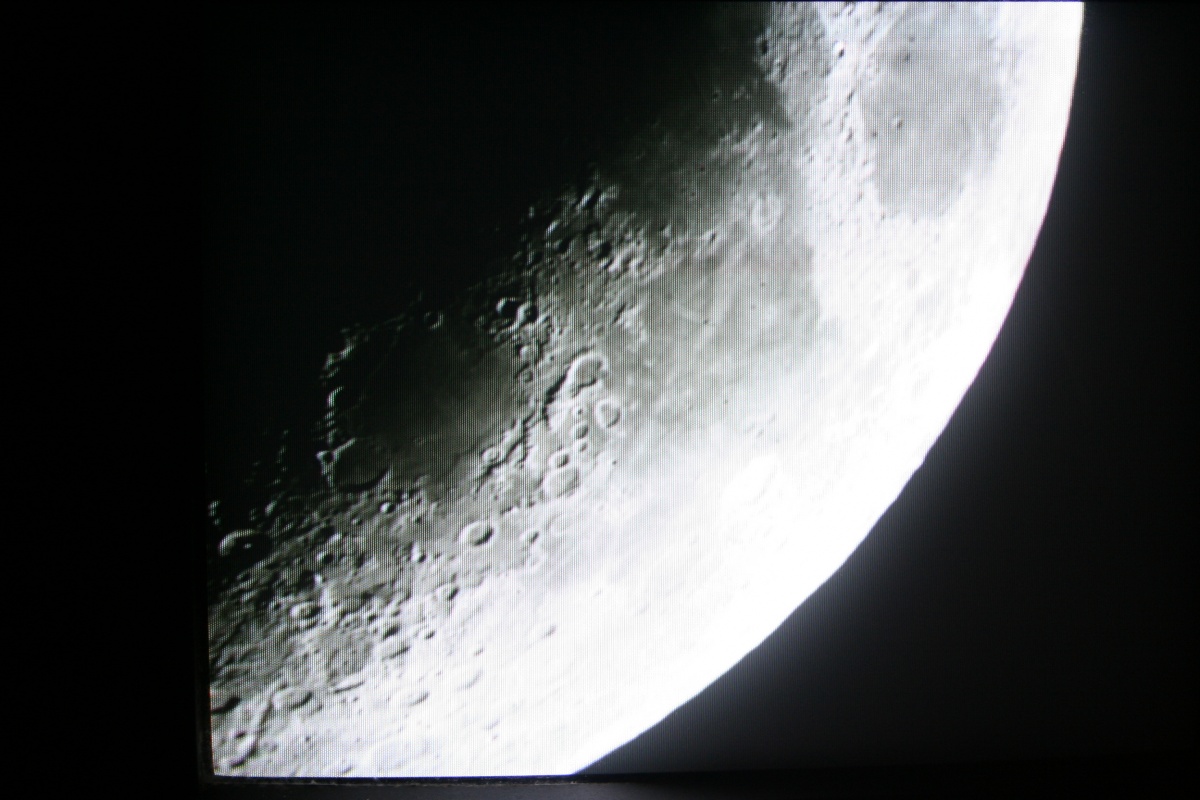TV image of crescent moon