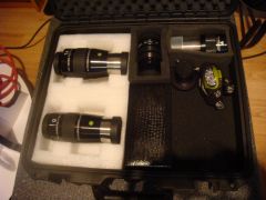 The suitcase. There's a 33mm WO UWAN at the top. The leather box at the bottom is the 1.25" Hotech SCA laser collimator.