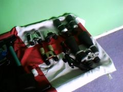 My collection of binoculars 
Binos:Mega zoom binoculars = 12-60 x 70 bak 4 prism ruby coated optics. 171 ft/1000 yds 57m/1000m,
Paramax = 12 x 32mm bak 7 roof prism ruby coeated 79m/1000m,
WA = 10 x 50 Field 6 105m/1000m,
Compact Zoom = 7-22 x 22mm 73